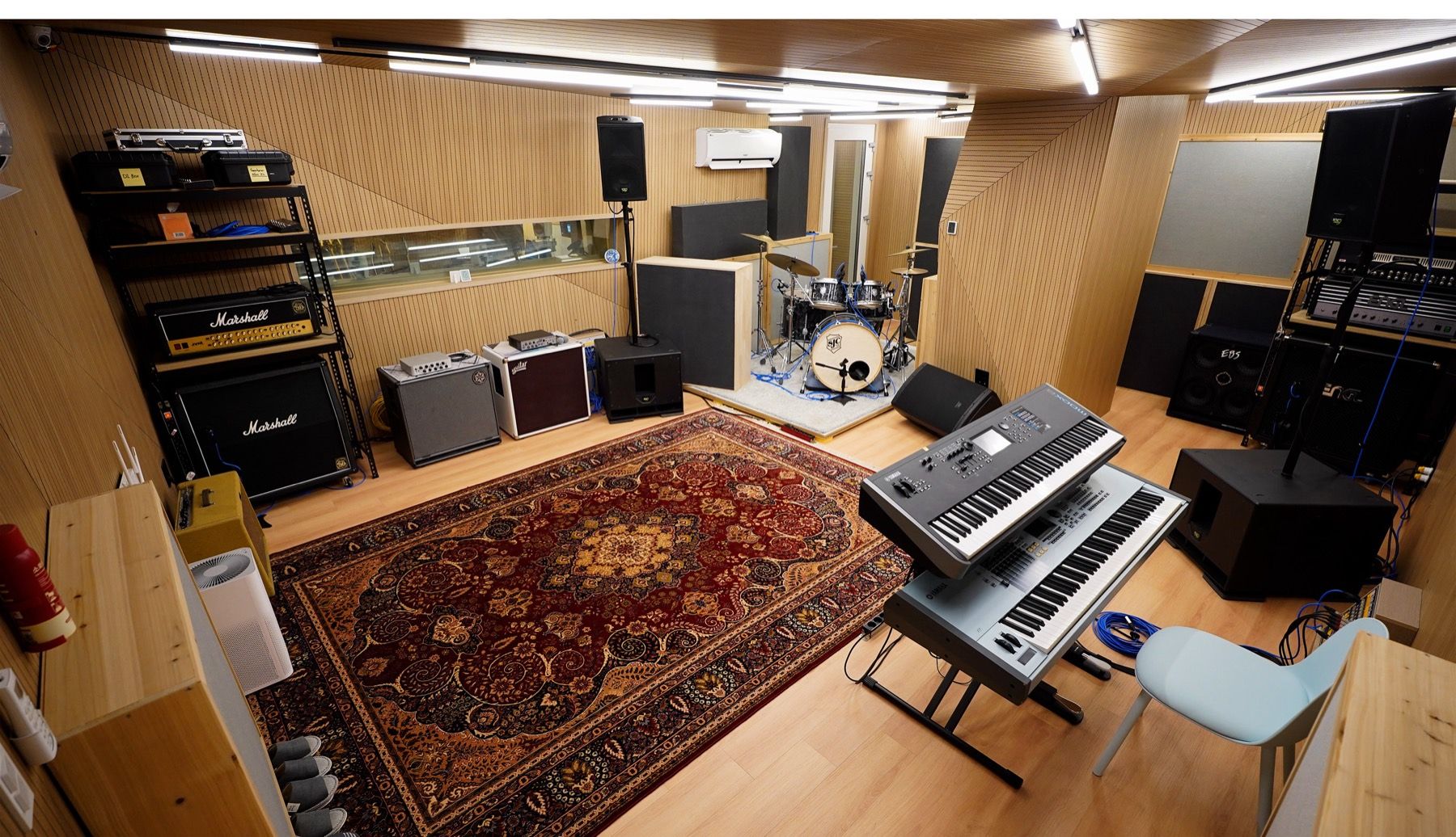 The drum kit set up in the live room